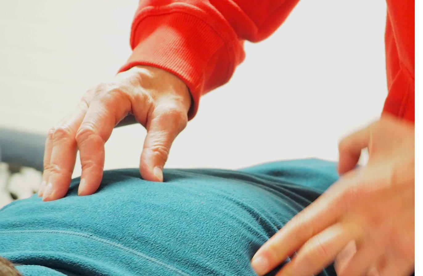 Dr. Ray Koury performing chiropractic treatment