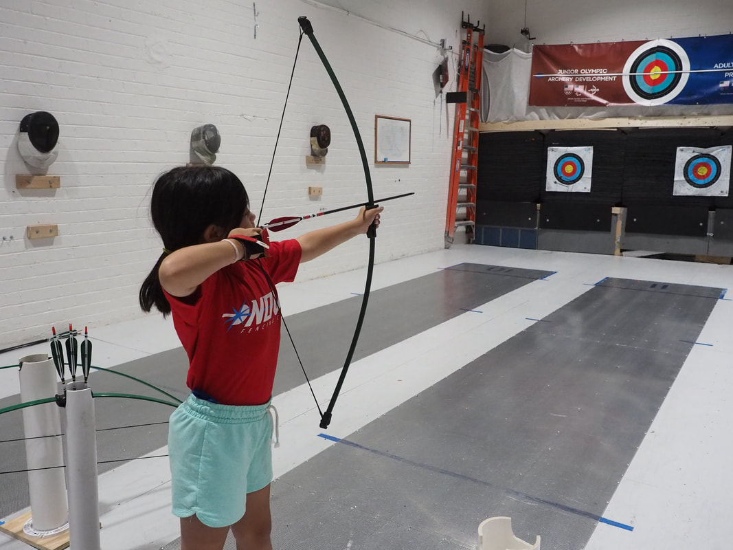 Archer shooting at a target